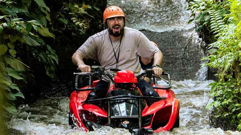 Ubud ATV Quad Bike through River Jungle Rice Fields Cave Puddles